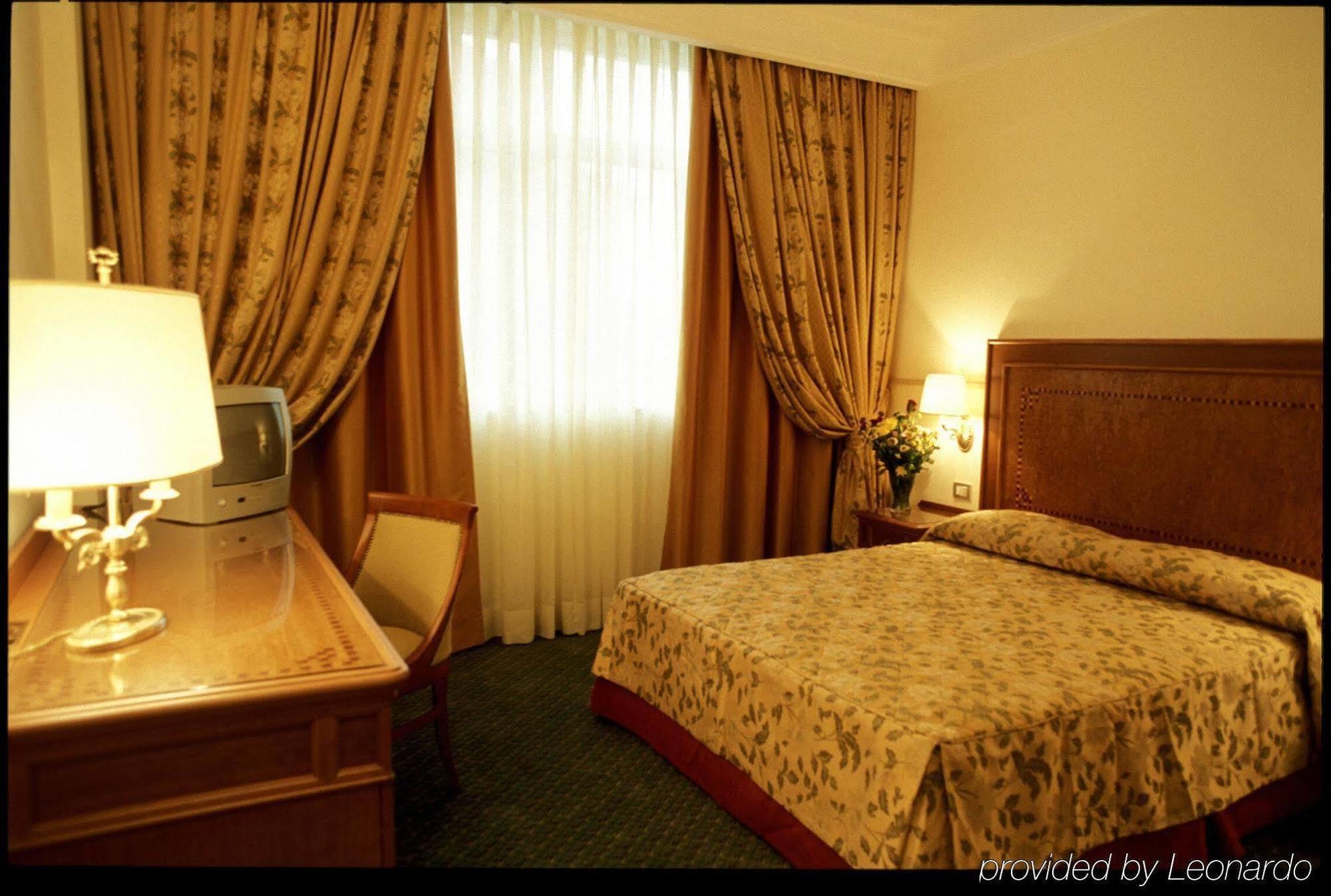 Sunrise Hotel Róma Szoba fotó